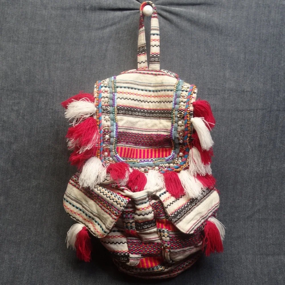 America & Beyond Boho Woven Backpack Womens Small Tassel Multicolor Festival Bag